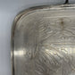 Exceptional footed silver tray with wooden serving handles and bird and floral engraving scene