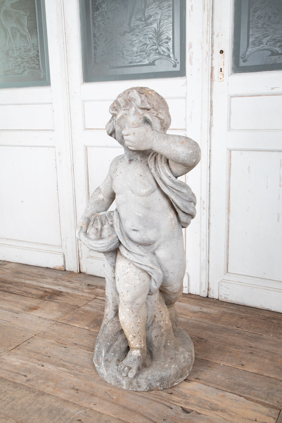 Concrete Cherub on wooden plinth